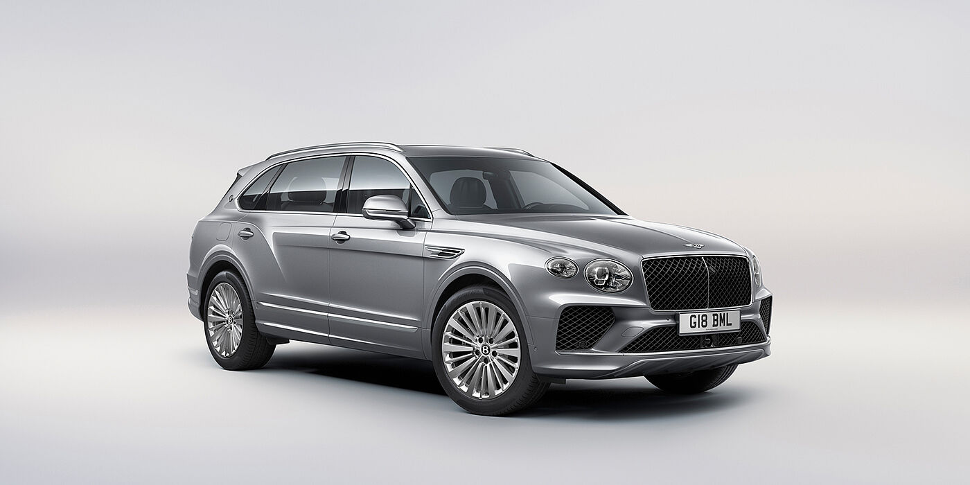 Bentley Milano Bentley Bentayga Extended Wheelbase luxury SUV front three quarter view in Moonbeam paint with 21 inch five spoke painted wheels