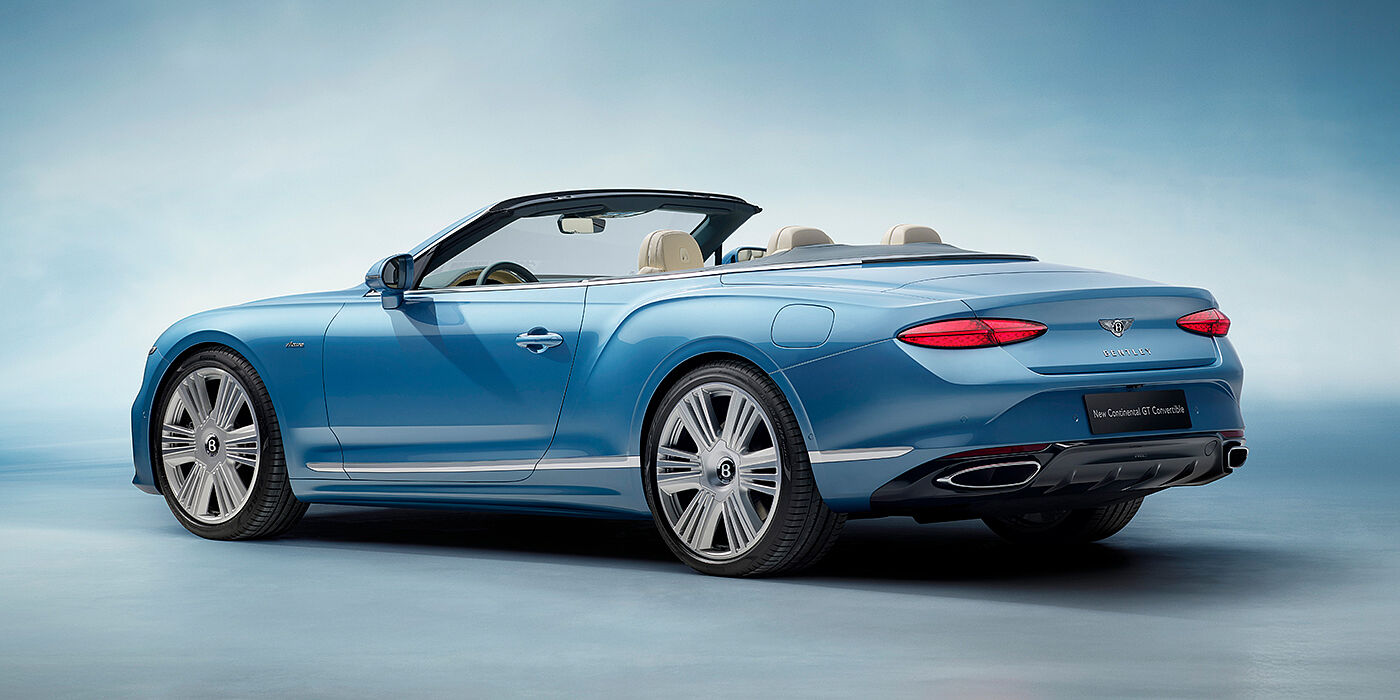 Bentley Milano New Bentley Continental GTC Azure convertible rear view in Light Windsor blue paint with 22 inch ten spoke wheels and chrome exterior details