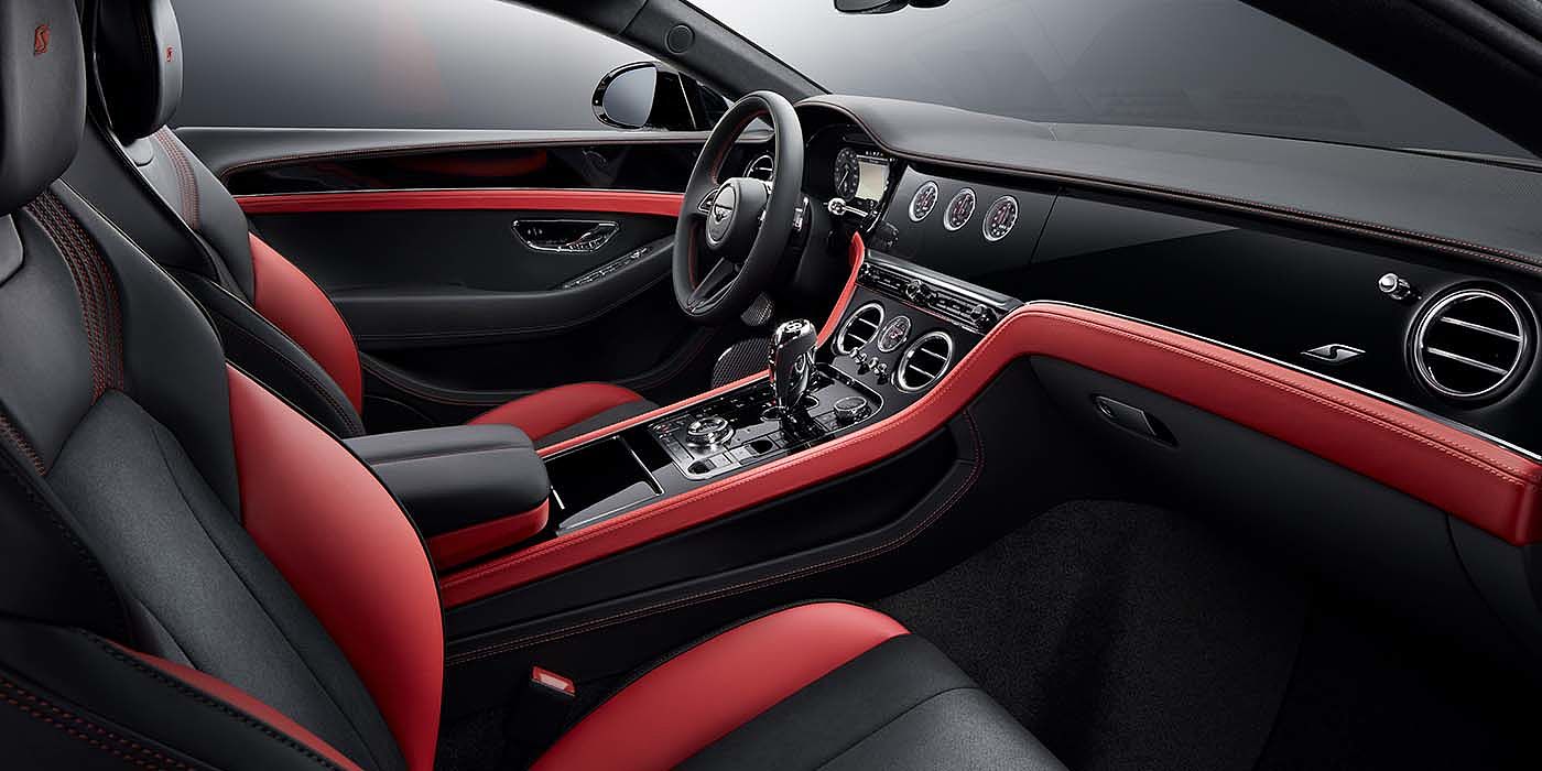 Bentley Milano Bentley Continental GT S coupe front interior in Beluga black and Hotspur red hide with high gloss Carbon Fibre veneer