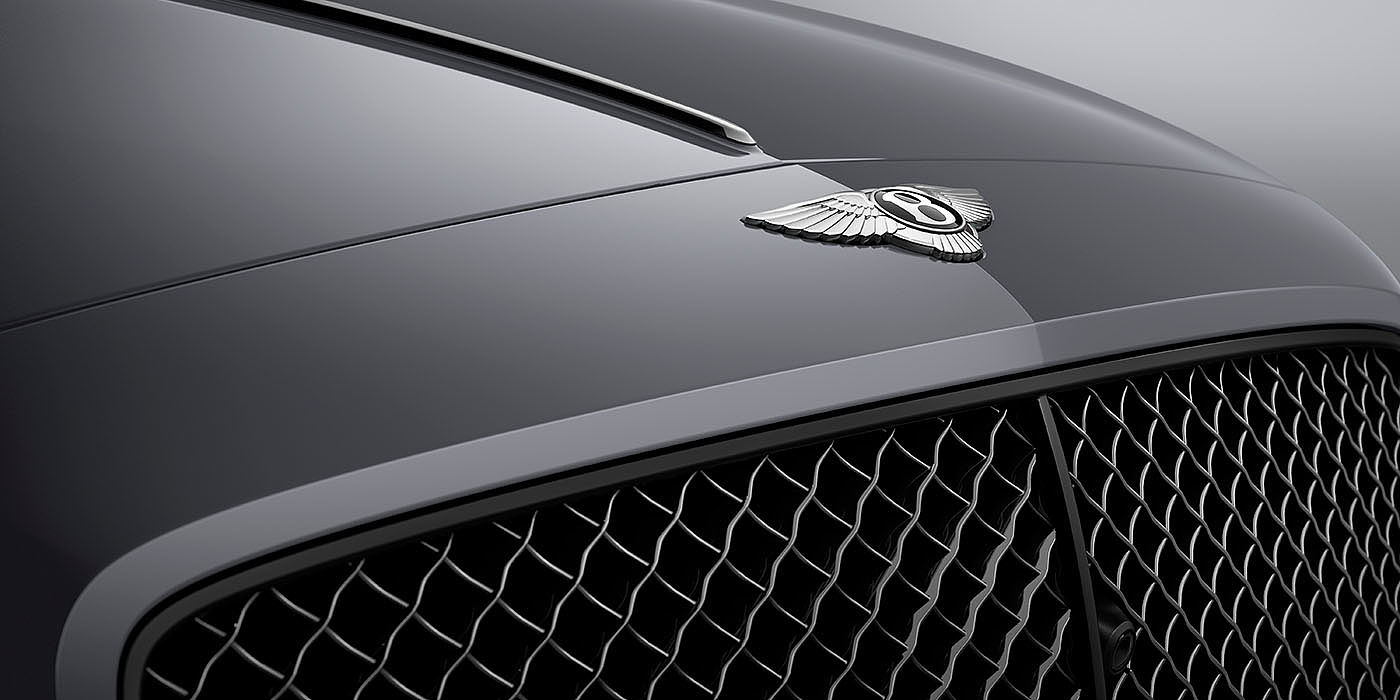 Bentley Milano Bentley Flying Spur S Cambrian Grey colour, featuring Bentley insignia and assertive matrix front grillle