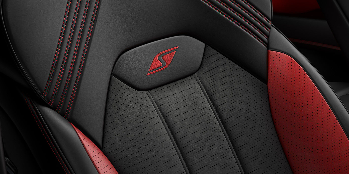 Bentley Milano Bentley Bentayga S seat with detailed red Hotspur stitching and black Beluga coloured hide. 