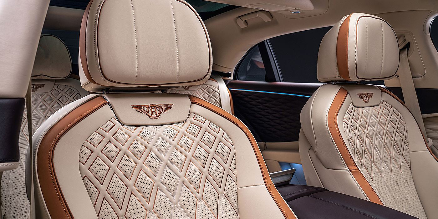 Bentley Milano Bentley Flying Spur Odyssean sedan rear seat detail with Diamond quilting and Linen and Burnt Oak hides