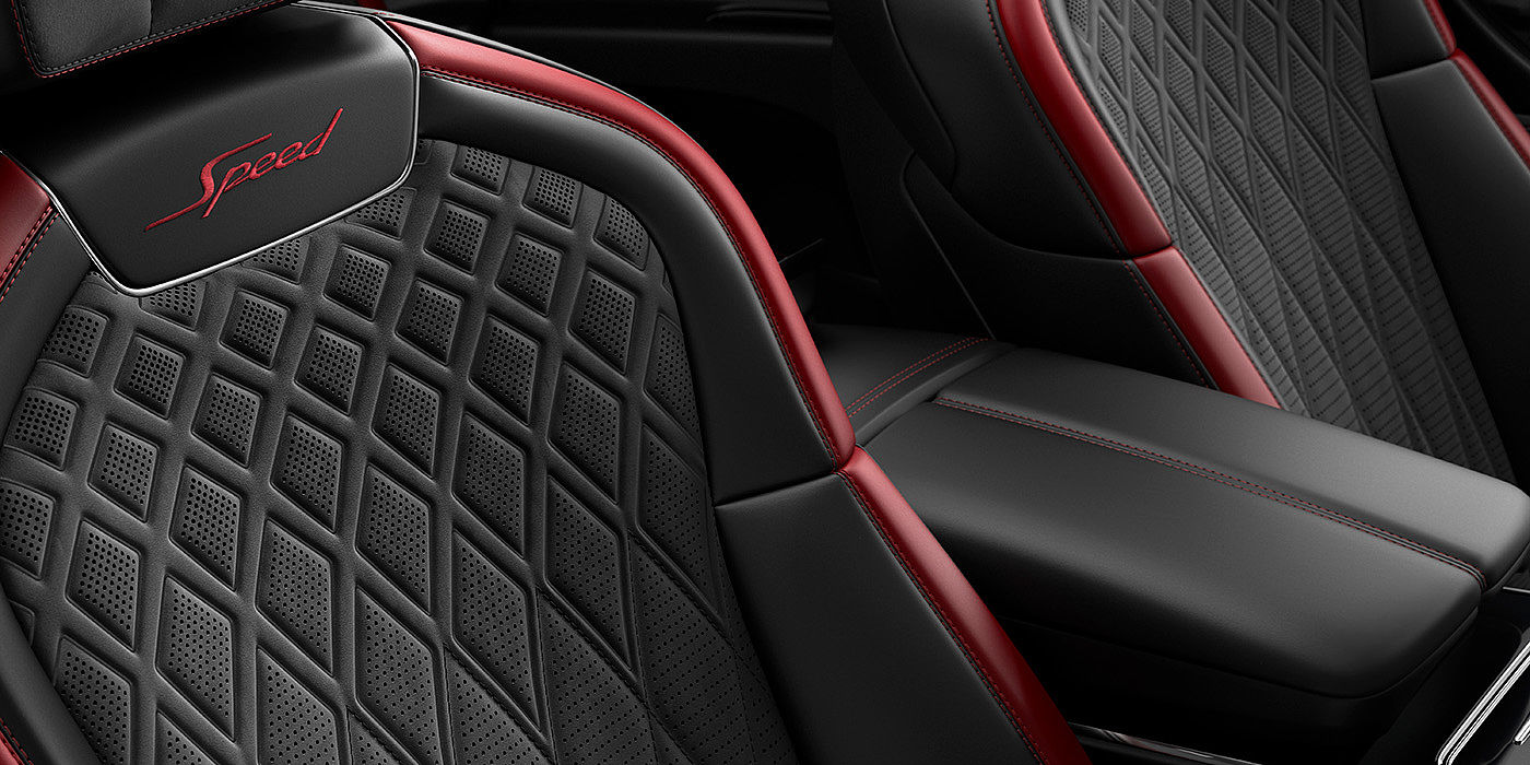 Bentley Milano Bentley Flying Spur Speed sedan seat stitching detail in Beluga black and Cricket Ball red hide