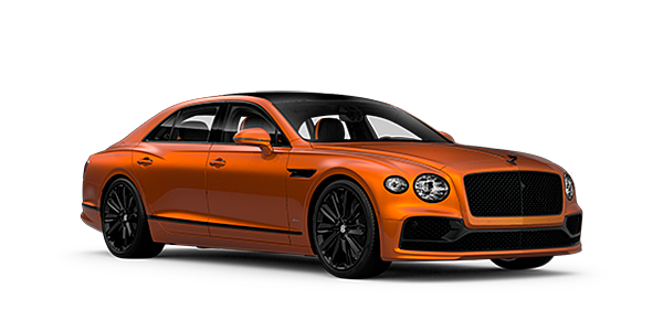 Bentley Milano Bentley Flying Spur Speed front side angled view in Orange Flame coloured exterior. 