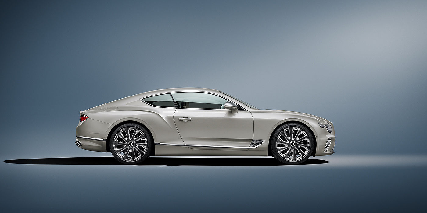 Bentley Milano Bentley Continental GT Mulliner coupe in White Sand paint front 34