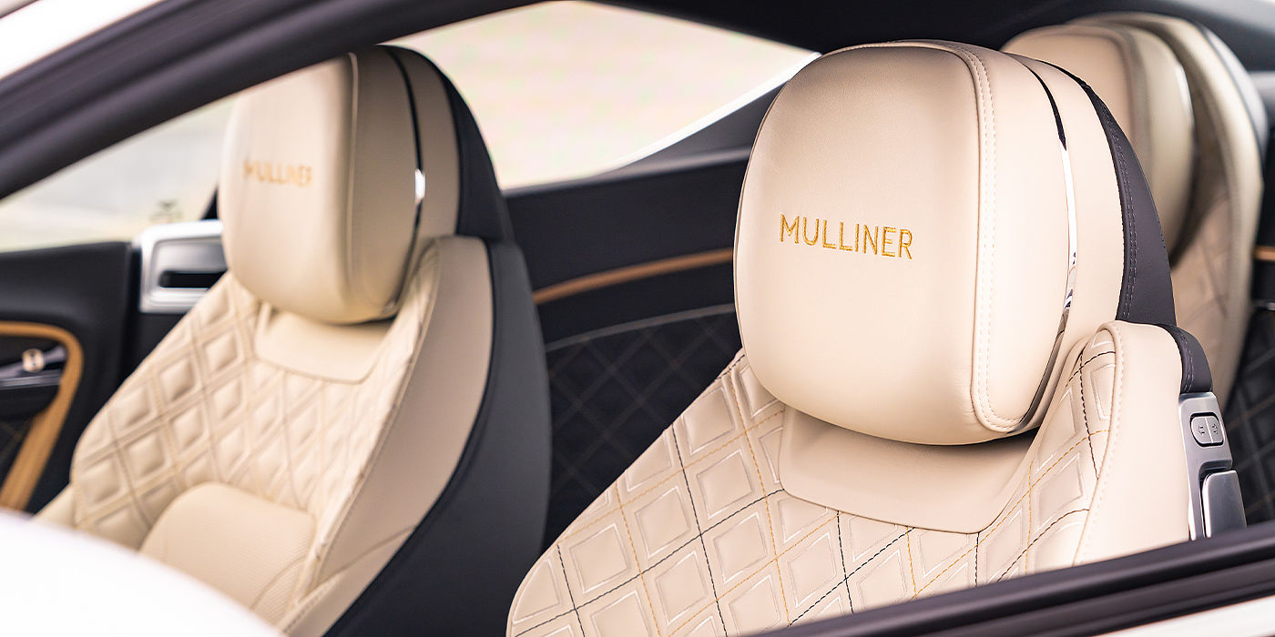 Bentley Milano Bentley Continental GT Mulliner coupe seat detail in Beluga black and Linen hide
