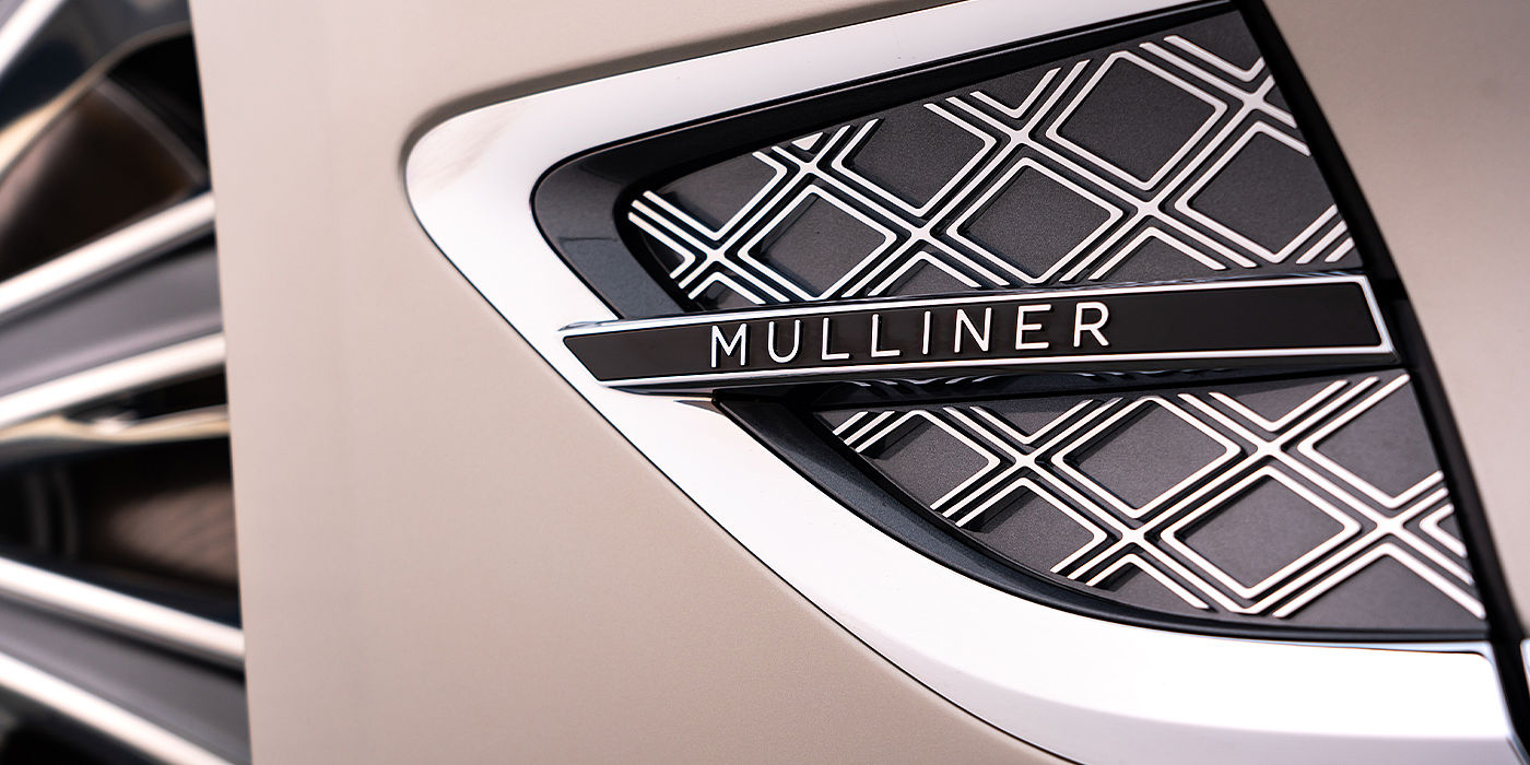 Bentley Milano Bentley Continental GT Mulliner coupe in White Sand paint Mulliner wing vent close up
